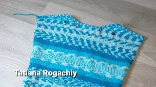 We knit the neck and bevel of the shoulder in short rows without tearing off the thread. Knitting