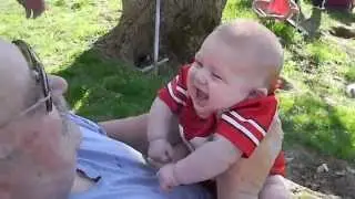 Baby Brandon having fun with grandpa