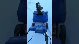 Using my SnowJoe snow blower on some powdery snow