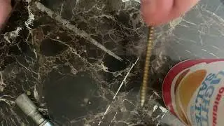 How to unlock a lock on a gas meter.