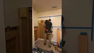 Installing a header for an opening to a slide.