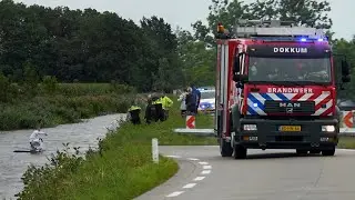 [25.08.2020] Brandweer redt man van dak van te water geraakte Porsche Cayenne Trekwei - N910 Driezum