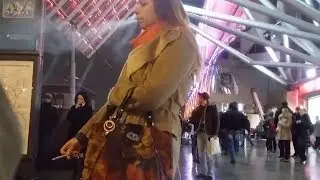 Woman hungrily smokes a cigarette