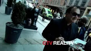 Quentin Tarantino signing autographs on GTV Reality