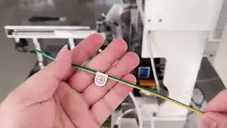 Wire cable terminal assembly flag tagging machine