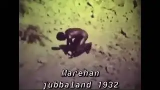 Starving somali kid dancing on a beach captured by Italians