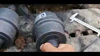 Катки опорные, замена на экскаваторе