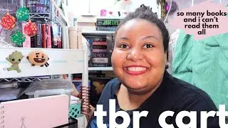 organizing my tbr cart and shelf! mini book unhaul for vlogmas day 6 ☆