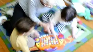Sam and Noah  playing with grandma rita