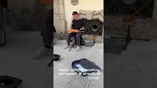 Music without touching instrument.Theremin.music in the air.streets of Italy.milan.extremely amazing