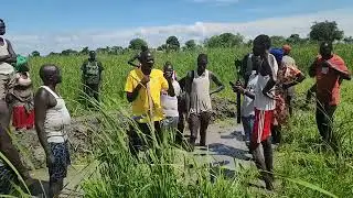 Leer County Commissioner Hon Stephen Taker and Dok Youths Constructing Dyke