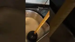 How to unclog a sink with a plunger 