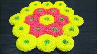 Crocheted rug from motifs with twisted posts.