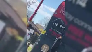 'Complete moron' criticised after clinging onto moving bus at 30mph
