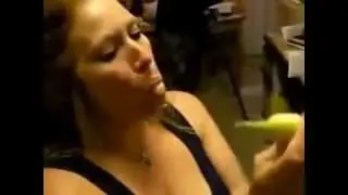 Girl puts two bananas in her mouth at once