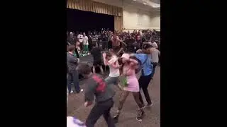 People in metal mosh pit going bonkers