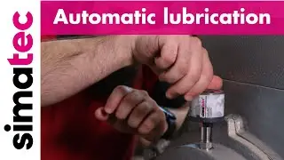 Automatic lubrication of an electric motor with simalube