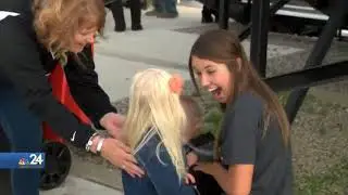 Liberty Center homecoming queen invites children with Down Syndrome to join her court.