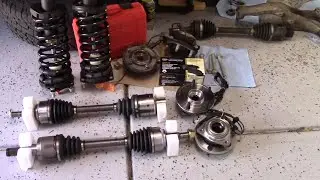 2006 Jeep Commander struts, shocks, CV axles and bearing replacement.
