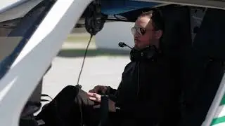 Electric airplane flying GREEN FLIGHT ACADEMY