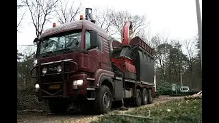Tinssen Grondverzet en Bosbouw: Biomass chipping with Ufkes Greentec 962 on MAN Truck.