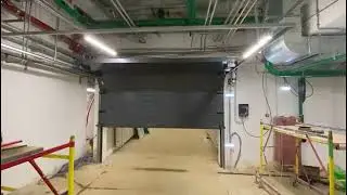 Секционные противопожарные ворота FireTechnics тип FT S EI60 с калиткой, Паркинг подземный в ЖК