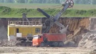 EKG-5 shovel loads overburden on KAMAZ-6520 truck