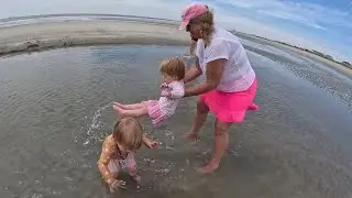 Twins take their family to the beach