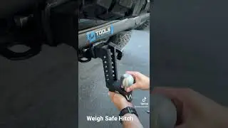Weighsafe clamshell hitch