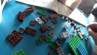 Assembling Minecraft Lego chicken set 21140