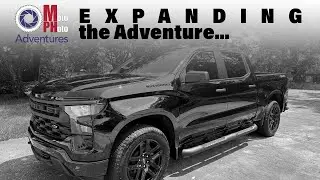 Adding a motor and 4 more wheels to the Adventure!