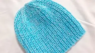 Шапочка спицами с красивой резинкой