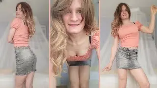 Young crossdresser dancing in festival outfit.