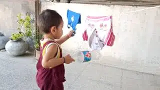 Little boy pinning the cloths | Learn with Arham