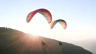 Paraglider performing a waltz - epic tandem flying 4K
