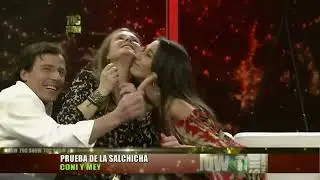 A well-known Cuban TV Show Host, Mey Santamaria, playing card kissing game with another lady_qvgHqk