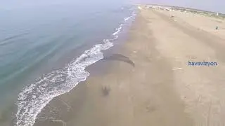 havavizyon.com ; Surfing with Paramotor over the beach and shotting shadow video during flight