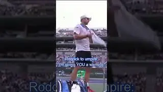 Roddick flips script, warns umpire. "Next one's a point a penalty!"