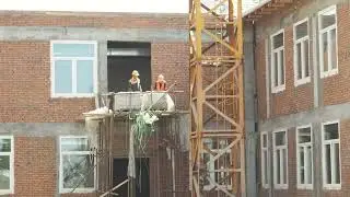 Кадры со стройплощадки школы в селе Кижинга