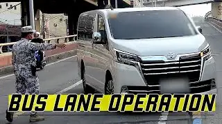 Cars inside the exclusive bus lane?