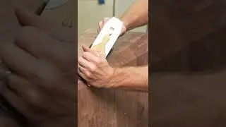 Hand plane on giant block of wood