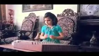 Twelve year old Iranian girl with talent of Santour