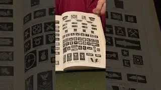 Vintage National Geographic featuring military insignia 1917