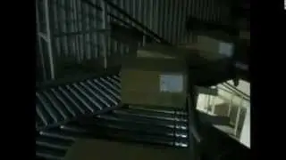 Транспортировка коробок роликовым конвейером и спуск на 2 м спиральным конвейером