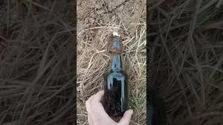 Полная пивная бутылка из немецкой траншеи