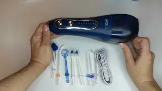 Ирригатор для очистки полости рта TOPSMILE.  Обзор.