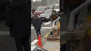 New York City (Bronx): Bum Chewing Down on Food, then Gets Interrupted by a Driver