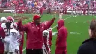 Gerald MCCOY AND THE SOONER CHEERLEADERS.