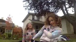 Lila and Kayley twinning doing stretches