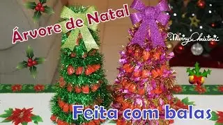 Árvore de Natal com bombons para decoração
